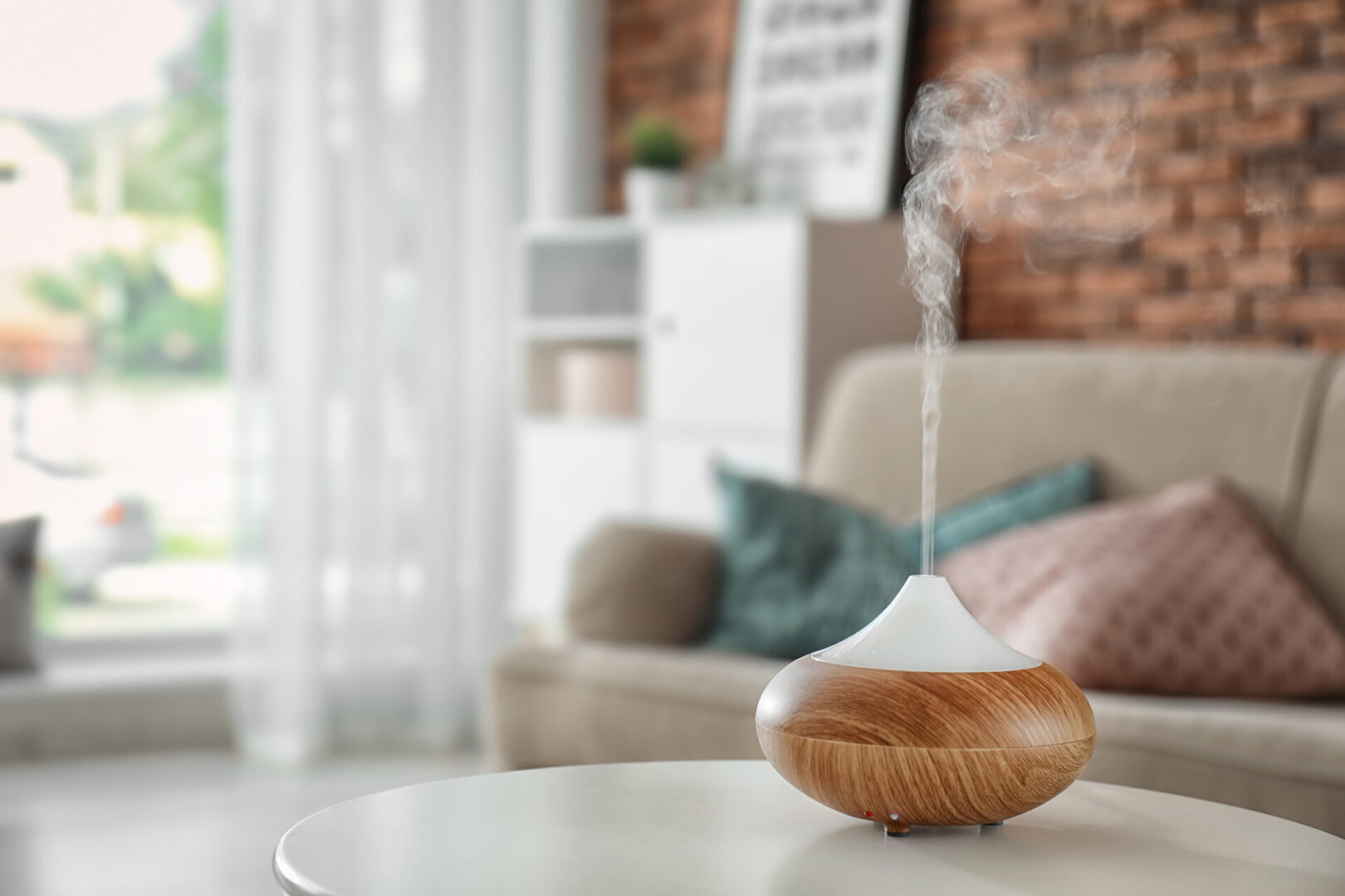 A diffuser on top of a table in the living room